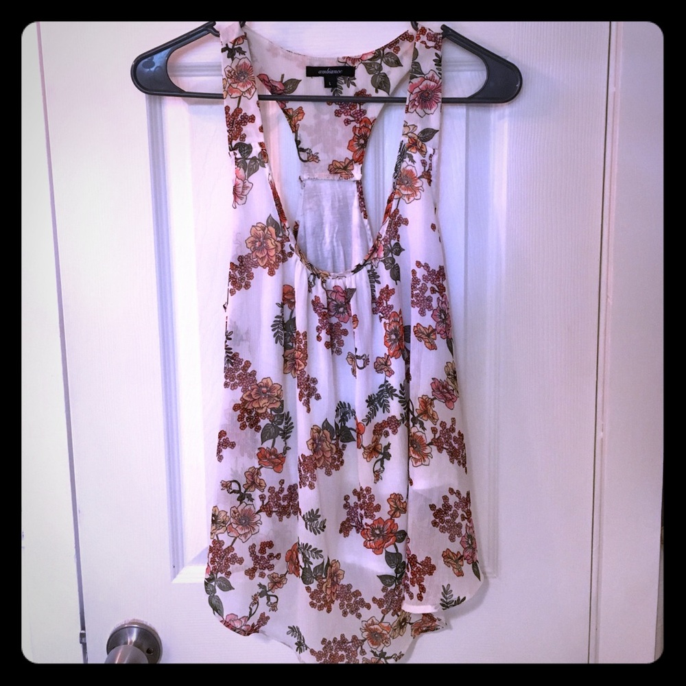 Cute and flowy floral top. Never worn.